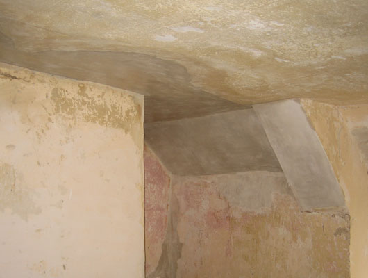 LIME PLASTERING: Patch repairs to plaster on a reed background